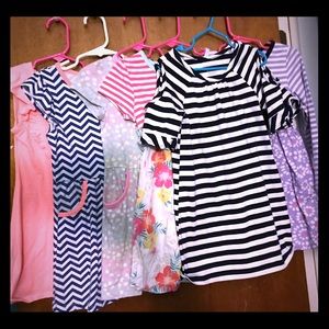 6 toddler play dresses. Size 5t. Good cond.
